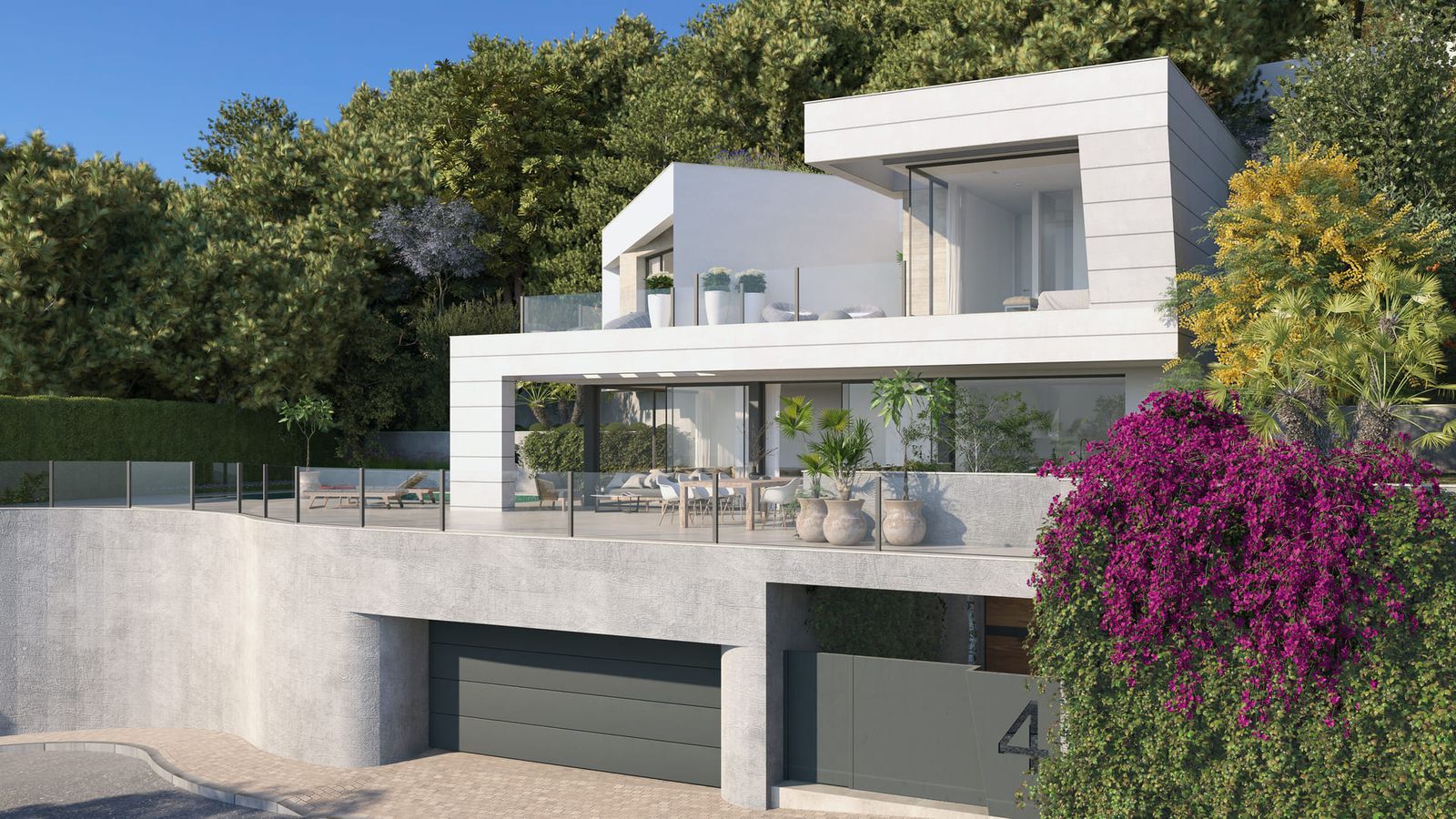Moderne witte villa met glazen balkons, buiten zitje en groen, met garage en paarse bloeiende struik.